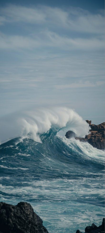 Seaside mobile wallpaper, rocks, waves, white clouds