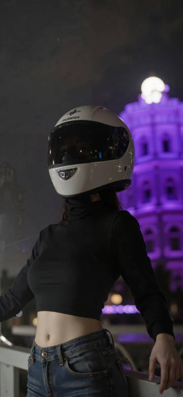 Girl in Motorcycle Helmet Under Neon Lights 4K Phone Wallpaper