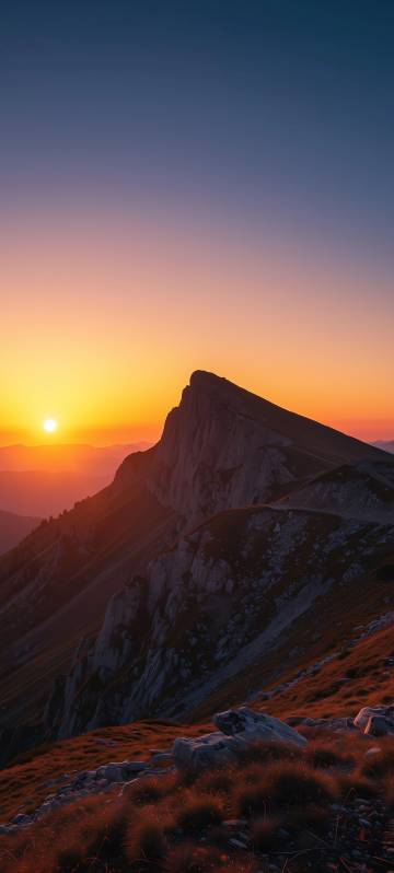Sunset phone wallpaper: mountain tops, blue sky, beautiful sky