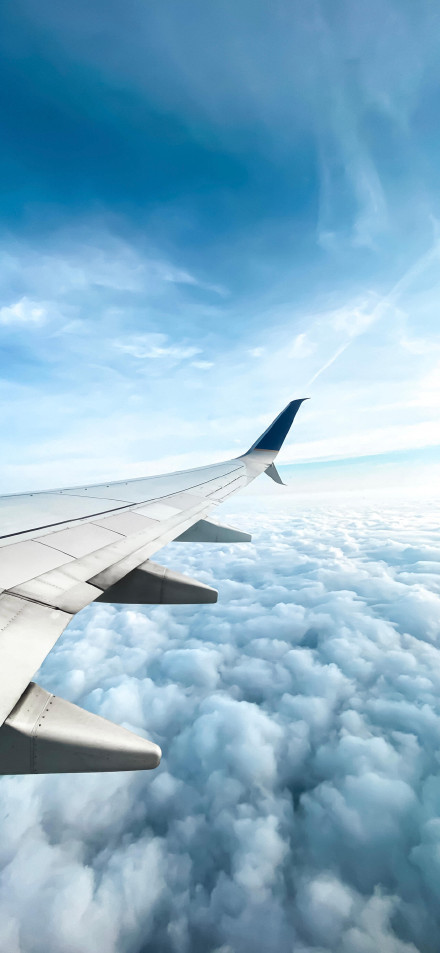 Airplane Wing Soaring Over Puffy White Clouds Wallpaper Airplane Wing Soaring Over Puffy White Clouds Wallpaper