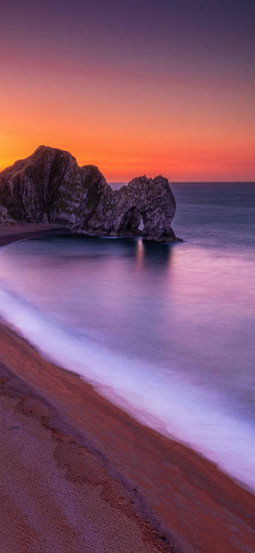 Landscape Wallpaper: Jurassic Coast Arch, Pink Purple Sky, Beach