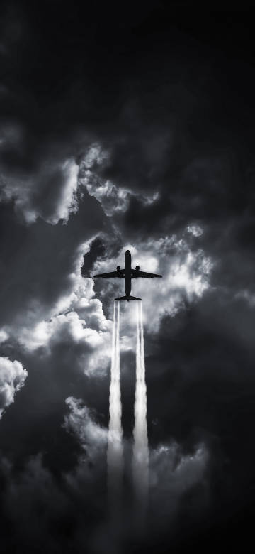 Clouds and Airplane in Moody Sky 4K Wallpaper