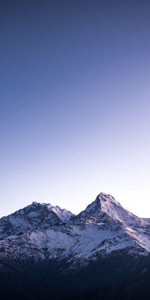 Majestic Snow-Capped Mountains at Dusk