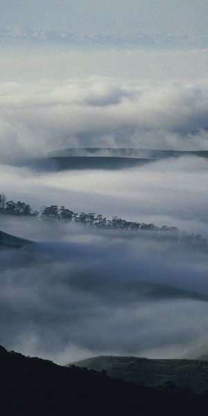 Phone wallpaper: Clouds, Haze, Mountains, Fog, Trees, Nature, Darkness free download