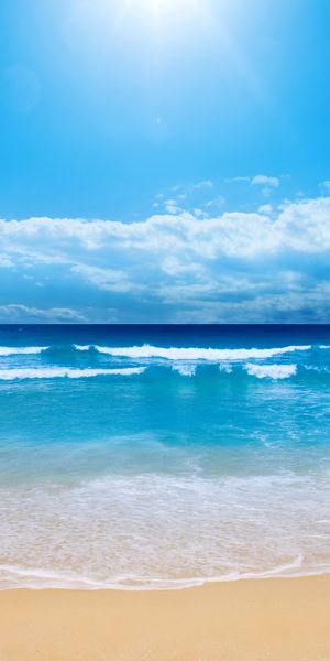 Breathtaking Ocean and Beach Scene for Your Phone Wallpaper