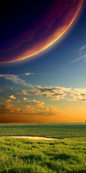 Enchanting mobile wallpaper featuring a dreamy Earth landscape and sky