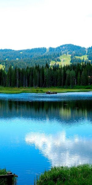 Beautiful Lakeside Landscape with Mountains and Reflection