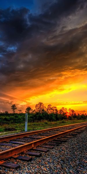 Breathtaking Sunset Over Railroad Tracks