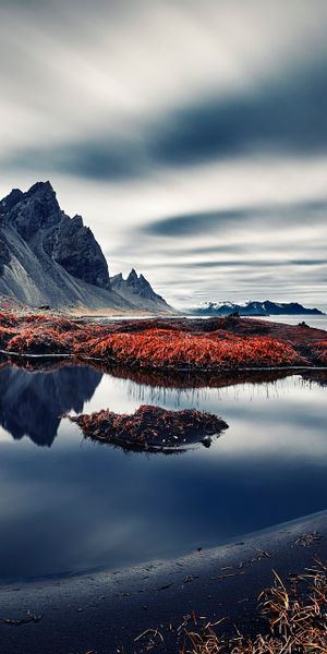 Breathtaking Vestrahorn Mountains and Ocean Reflection Phone Wallpaper