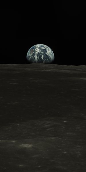 Earth Rising Above the Moon's Horizon