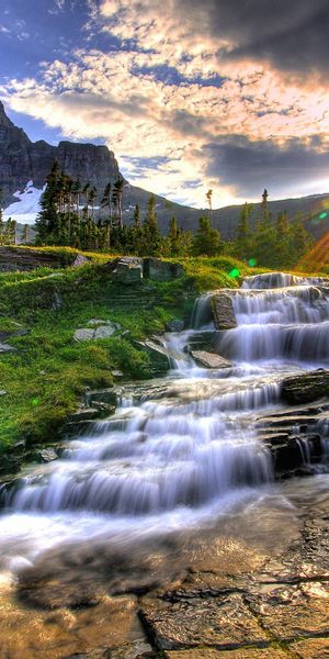 Breathtaking Sunrise over a Mountain Waterfall