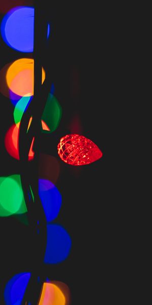 Vibrant Multicolored Garland Lights for Your Phone Wallpaper
