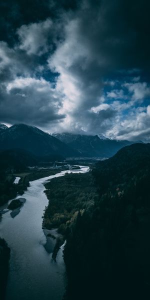 Serene German Landscape: Mountains, Rivers, and Clouds - Perfect Phone Wallpaper