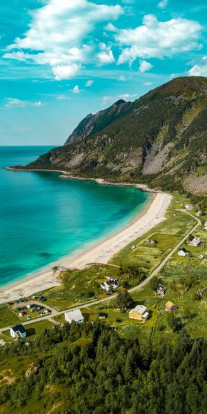 Serene Beach and Mountain Aerial View