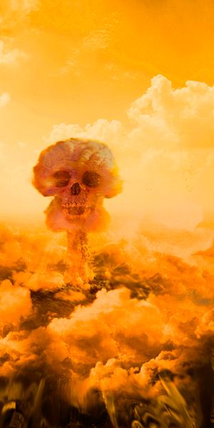 Nuclear Explosion Wallpaper with Skull in Fiery Orange Sky