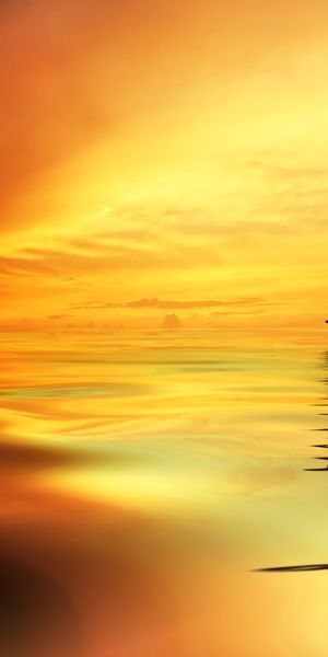 Serene yacht sailing into a vibrant sunset - ideal phone wallpaper