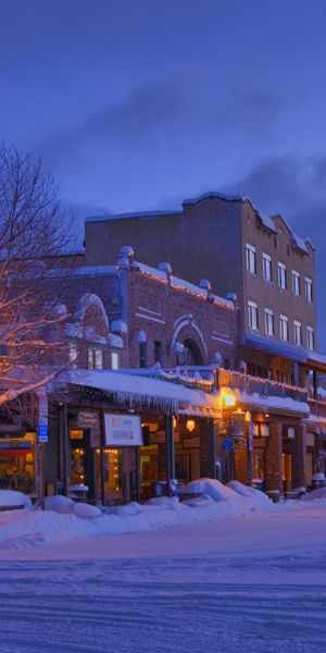 Beautiful Snowy Town Street at Night