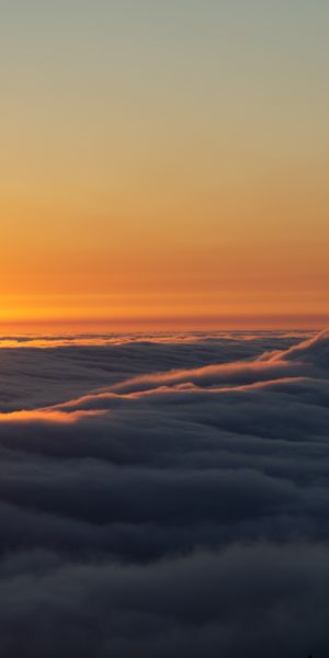 Breathtaking Sunset Over a Sea of Clouds