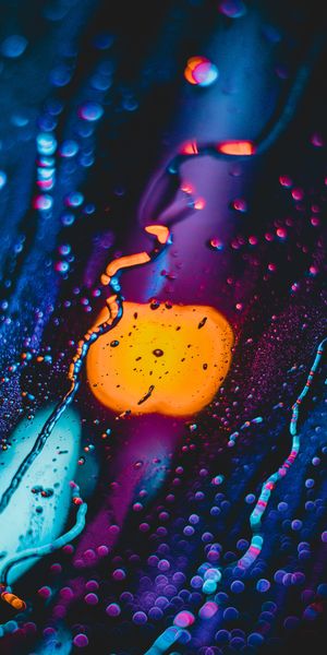 Vibrant Neon Drops Wallpaper with Glare and Smooth Blur