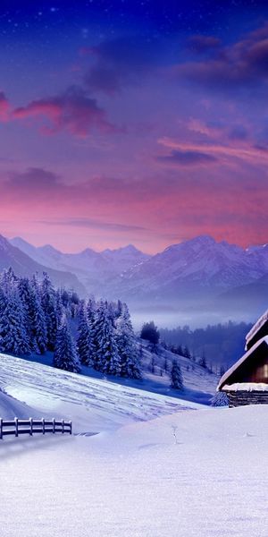 Breathtaking Winter Landscape Wallpaper: Snowy Mountains and Charming Houses in 4K