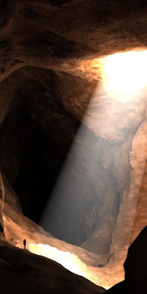 Breathtaking Cave Landscape Phone Wallpaper Featuring Light and Depth