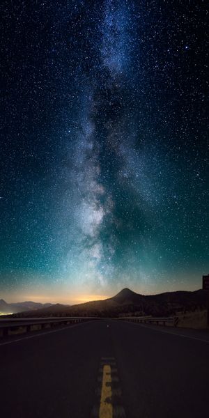 Breathtaking Starry Sky Above a Serene Road