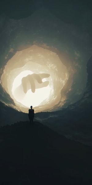 Mysterious Silhouette with Hand Art in a Dark Cave