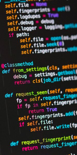Vibrant Multicolored Programming Code Wallpaper