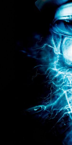 Free dark skull wallpaper featuring electric blue effects for a striking look