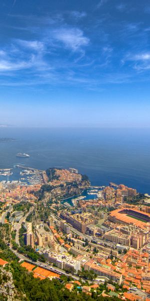 Stunning HD wallpaper featuring Monaco's coastline and vibrant cityscape