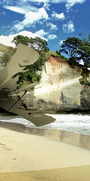 Breathtaking iPhone Wallpaper Featuring Serene Beach and Majestic Cliffs