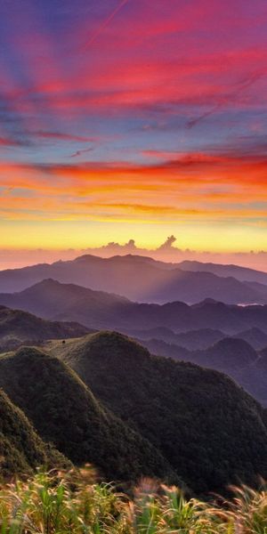 Breathtaking Sunset View Over Mountains and Hills