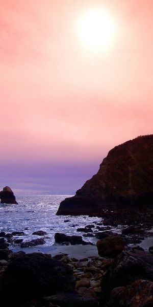 Serene Sunrise Over the Coastline: A Perfect Mobile Wallpaper