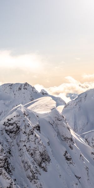 Breathtaking Snowbound Mountain Range Wallpaper