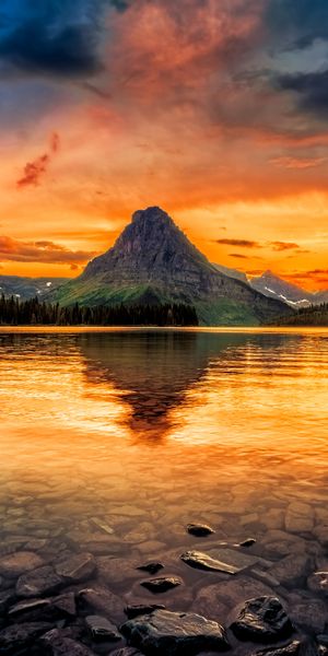 Beautiful Sunset Over Glacier National Park Lake
