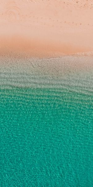 Aerial View of Beach and Crystal Clear Water