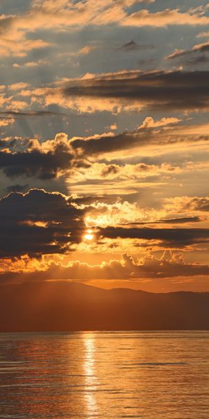 Breathtaking sunset mobile wallpaper featuring vibrant colors and nature's beauty