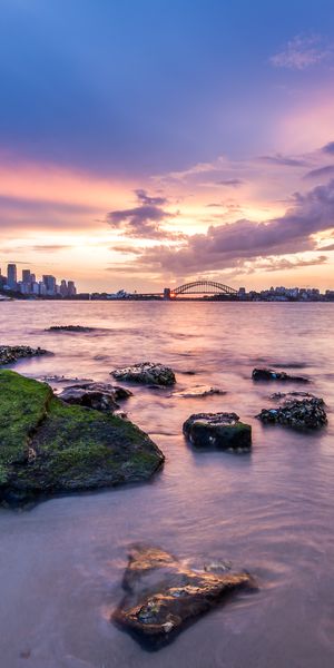 Breathtaking Sydney Sunset Over Man-Made Cityscape