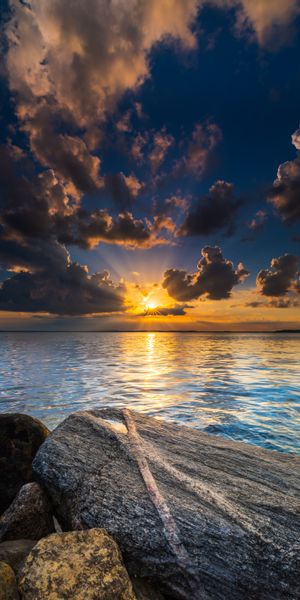 Breathtaking Sunrise Over a Calm Lake