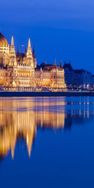 Hungarian Parliament Building at Night: A Reflection on the Danube
