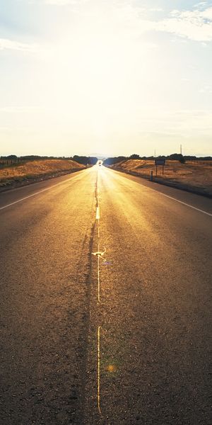 Phone wallpaper: Sunset, Road, Man Made free download