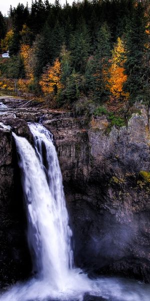 Breathtaking Autumn Waterfall in a Mountain Landscape