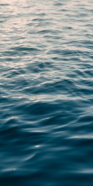 Smooth Ripples Over Calm Sea Water