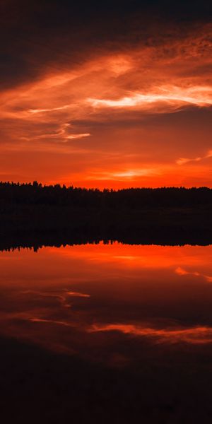 Captivating 4K phone wallpaper of a twilight river at sunset