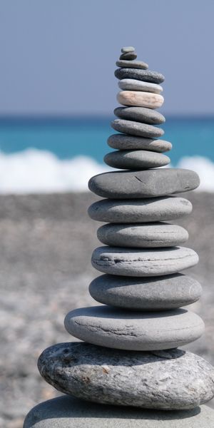 Majestic Stone Stack on a Tranquil Beach