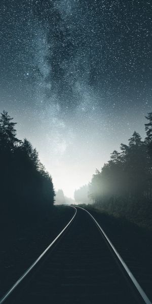 Enchanting Nighttime Railroad Scene with Starry Sky - HD Phone Wallpaper