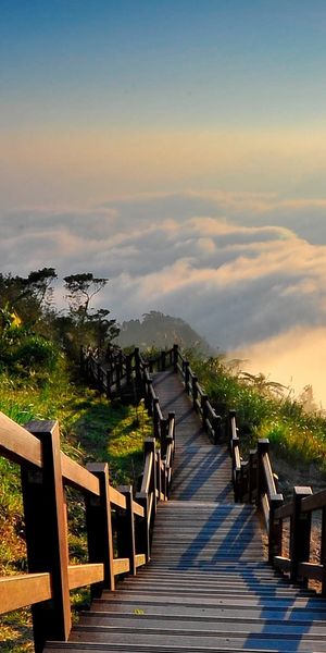 Cool Sunrise Over Cloudy Landscape with Wooden Steps