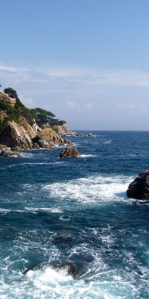 Coastal View with Rocks and Blue Sea