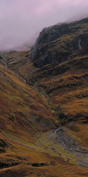 Breathtaking Glen Coe Landscape: Foggy Highlands of Scotland - Phone Background