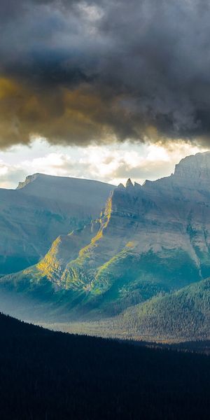 Phone wallpaper: Sunbeam, Mountains, Cliff, Forest, Mountain, Earth, Cloud, Landscape free download